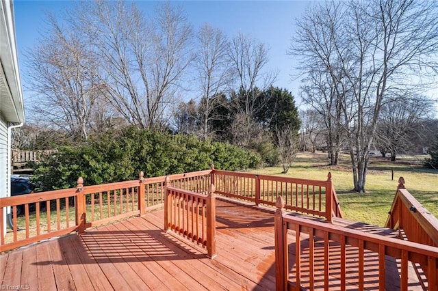 deck featuring a yard