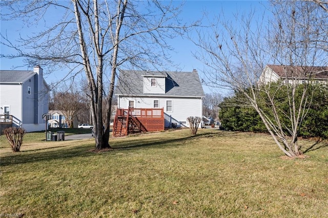 view of yard with a deck