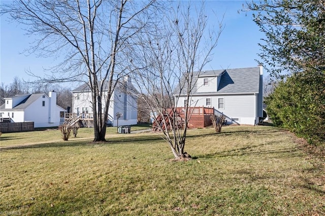 view of yard featuring a wooden deck