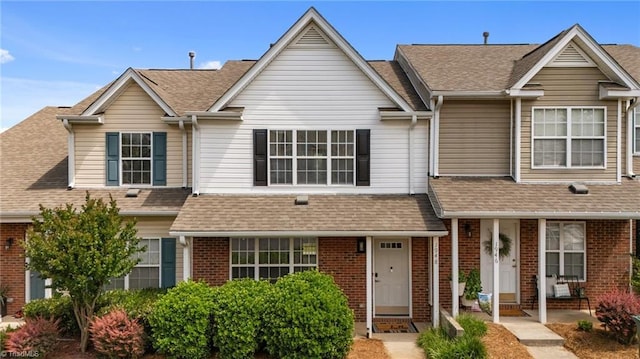 1948 Ray Alexander Dr, Greensboro, NC 27410 - view of property with brick siding and a shingled roof