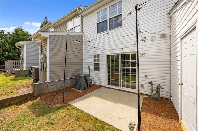 1948 Ray Alexander Dr, Greensboro, NC 27410 - rear view of house with cooling unit and a patio