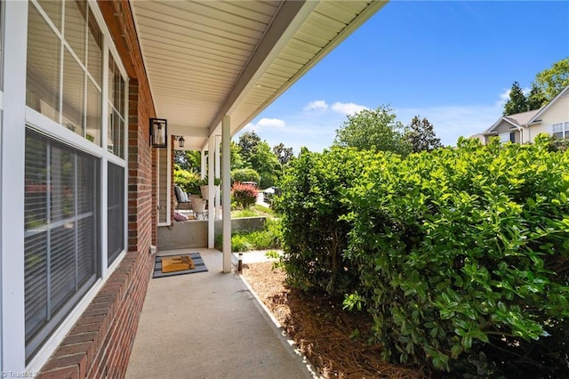 1948 Ray Alexander Dr, Greensboro, NC 27410 - view of patio / terrace featuring covered porch