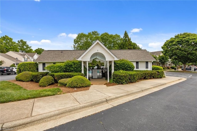 1948 Ray Alexander Dr, Greensboro, NC 27410 - view of front of property featuring a gate