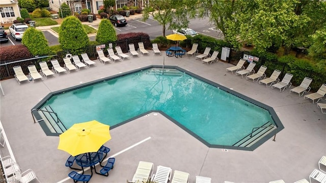 1948 Ray Alexander Dr, Greensboro, NC 27410 - community pool with a patio and fence