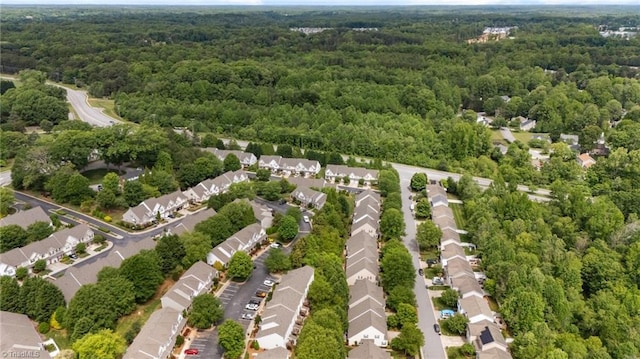 1948 Ray Alexander Dr, Greensboro, NC 27410 - aerial perspective of suburban area featuring a heavily wooded area