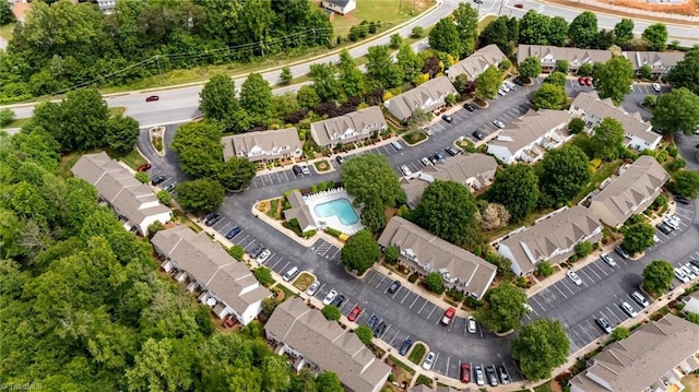 1948 Ray Alexander Dr, Greensboro, NC 27410 - aerial perspective of suburban area featuring a pool area
