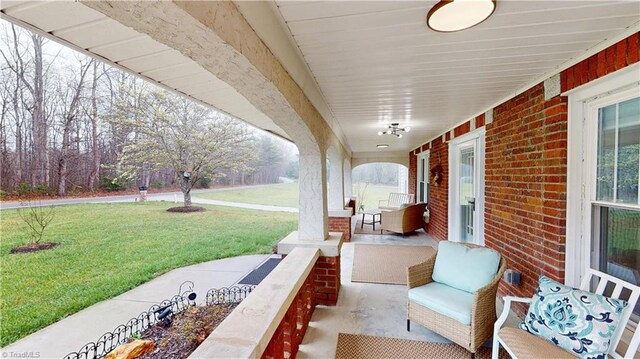 view of patio featuring covered porch