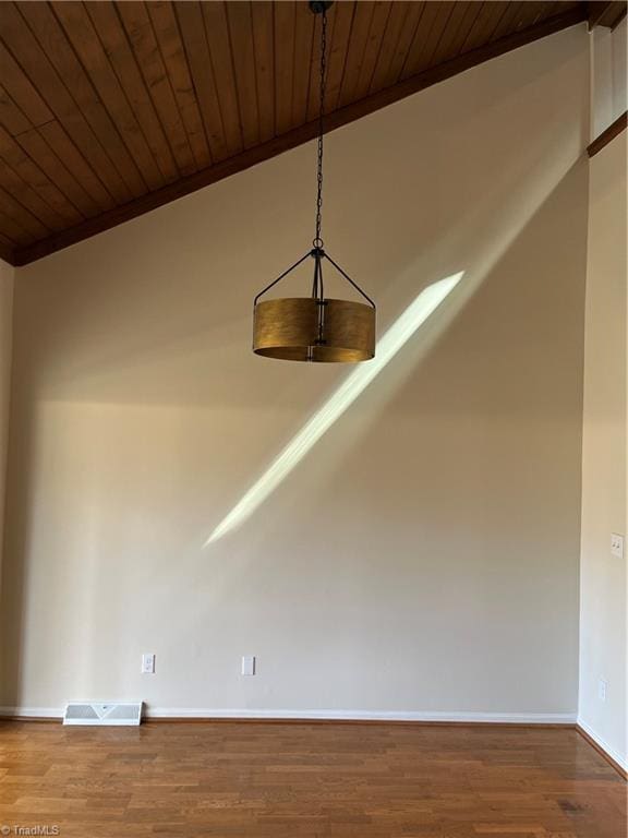 details with wooden ceiling, visible vents, and wood finished floors