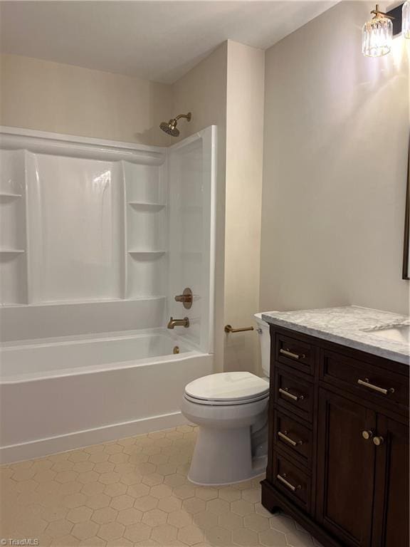 full bath featuring shower / bath combination, vanity, and toilet