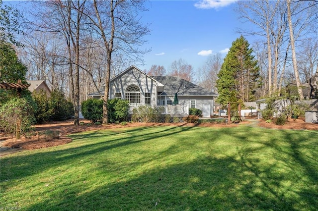 view of yard with a deck