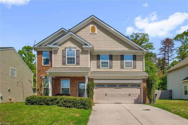 1420 Joyceland Rd, Kernersville, NC 27284 - view of front facade featuring brick siding, driveway, a front yard, and a garage