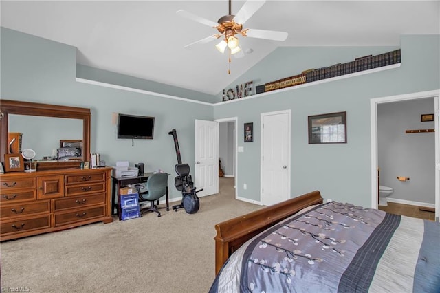 1420 Joyceland Rd, Kernersville, NC 27284 - carpeted bedroom with ensuite bathroom, baseboards, high vaulted ceiling, and a ceiling fan
