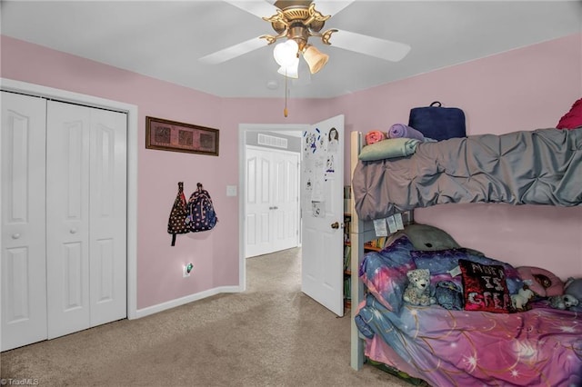 1420 Joyceland Rd, Kernersville, NC 27284 - carpeted bedroom featuring a closet, visible vents, baseboards, and ceiling fan