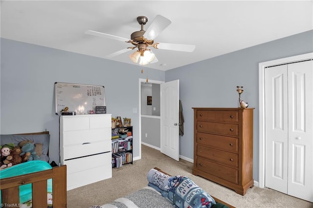 1420 Joyceland Rd, Kernersville, NC 27284 - bedroom featuring carpet, a closet, a ceiling fan, and baseboards