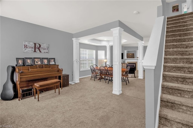 1420 Joyceland Rd, Kernersville, NC 27284 - interior space with carpet flooring, baseboards, ornate columns, stairs, and a fireplace