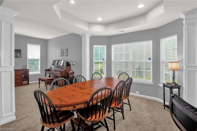 1420 Joyceland Rd, Kernersville, NC 27284 - dining area with a raised ceiling, baseboards, light carpet, and decorative columns