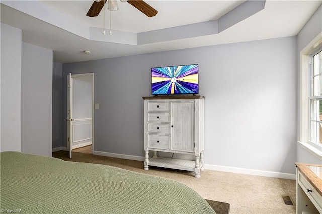 5711 Beaver Pond Trl, Pfafftown, NC 27040 - bedroom featuring carpet flooring, a raised ceiling, baseboards, and ceiling fan