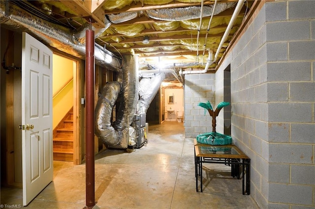 5711 Beaver Pond Trl, Pfafftown, NC 27040 - unfinished basement with stairs, concrete block wall, and heating unit