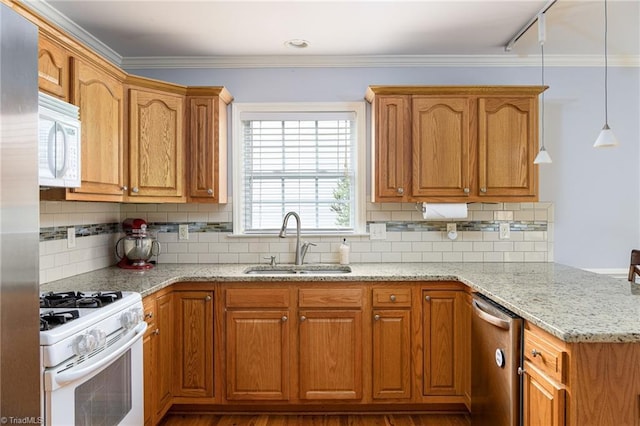 5711 Beaver Pond Trl, Pfafftown, NC 27040 - kitchen with white appliances, a sink, a peninsula, light stone counters, and tasteful backsplash