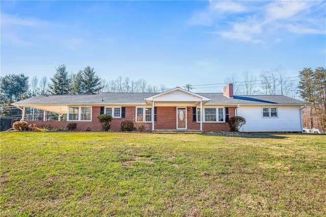 ranch-style home with a front lawn