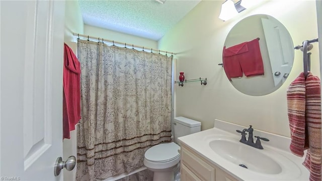 4401 Barndale Ct, Jamestown, NC 27282 - bathroom featuring vanity, a textured ceiling, and shower / tub combo