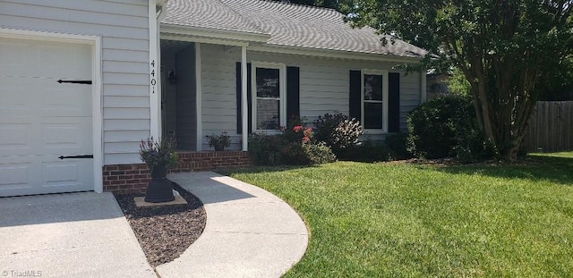 4401 Barndale Ct, Jamestown, NC 27282 - property entrance with roof with shingles and an attached garage