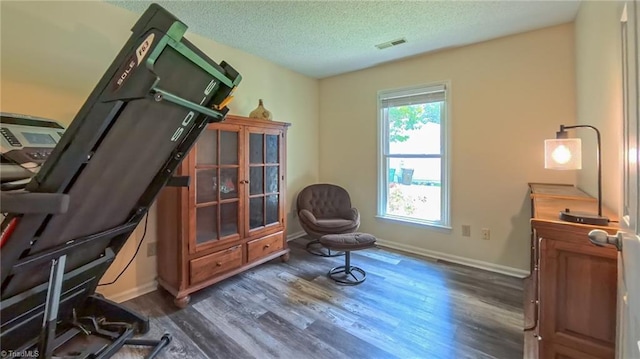 4401 Barndale Ct, Jamestown, NC 27282 - living area with dark wood finished floors and a textured ceiling