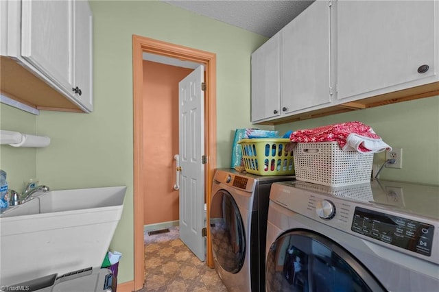 2719 NC Highway 87, Graham, NC 27253 - washroom with washer and dryer and cabinet space