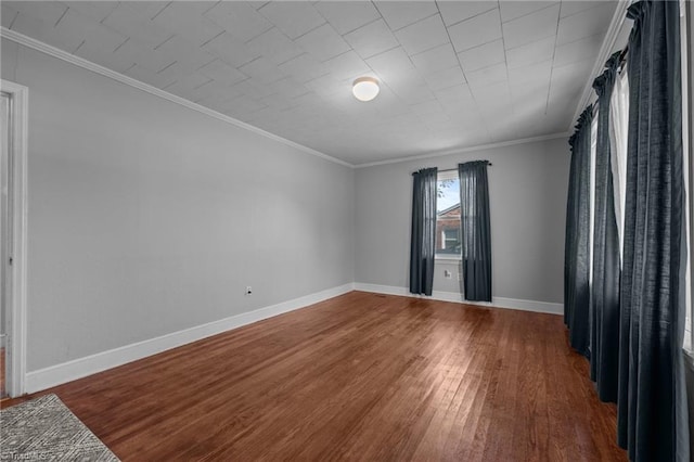2719 NC Highway 87, Graham, NC 27253 - unfurnished room featuring wood finished floors, baseboards, and crown molding