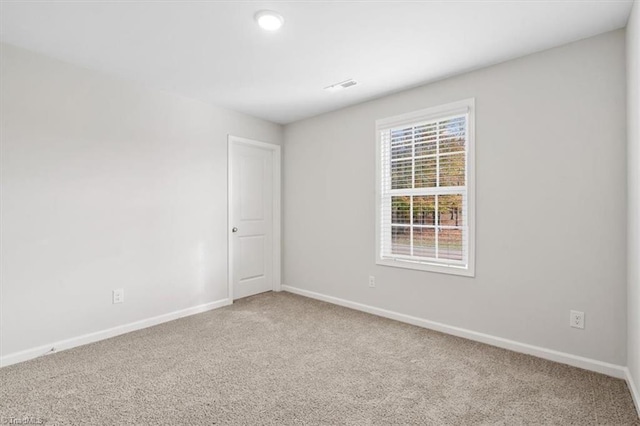4196 Emmas Way E, Bend, NC 27018 - carpeted spare room with baseboards