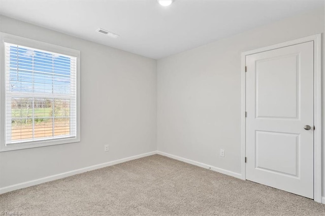 4196 Emmas Way E, Bend, NC 27018 - carpeted spare room with baseboards