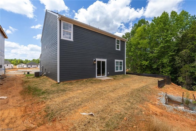 4196 Emmas Way E, Bend, NC 27018 - back of property featuring central AC unit
