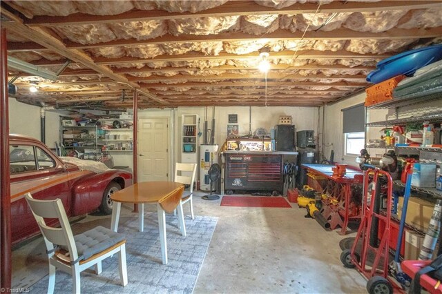 below grade area featuring a workshop area and a garage
