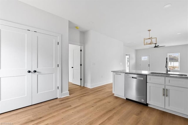 kitchen with ceiling fan, sink, dishwasher, light hardwood / wood-style floors, and white cabinetry