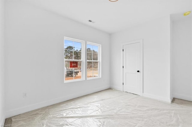 view of carpeted spare room