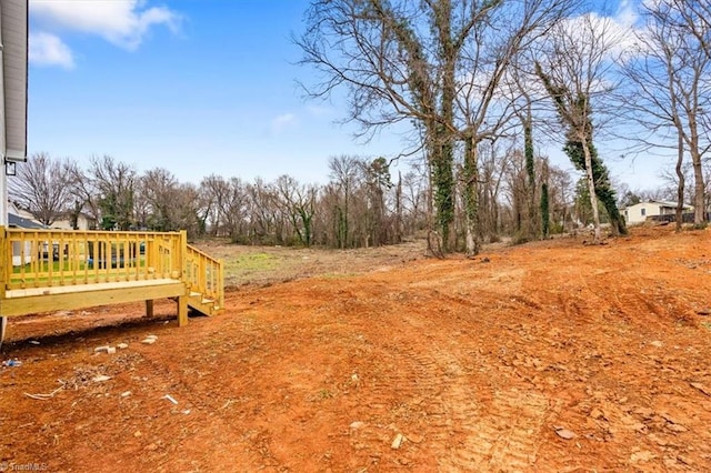 view of yard featuring a deck