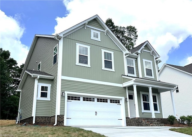 6005 Crestridge Ln Unit 1005, Winston-Salem, NC 27105 - traditional-style home featuring an attached garage, concrete driveway, and covered porch