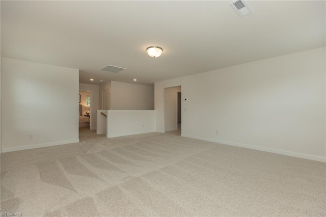 6005 Crestridge Ln Unit 1005, Winston-Salem, NC 27105 - empty room with light carpet and recessed lighting