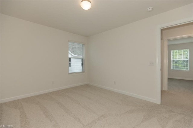 6005 Crestridge Ln Unit 1005, Winston-Salem, NC 27105 - empty room featuring light carpet and a smoke detector