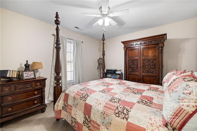 bedroom featuring visible vents, a ceiling fan, and carpet floors