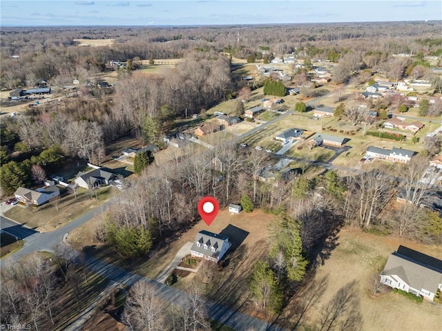 aerial view featuring a forest view