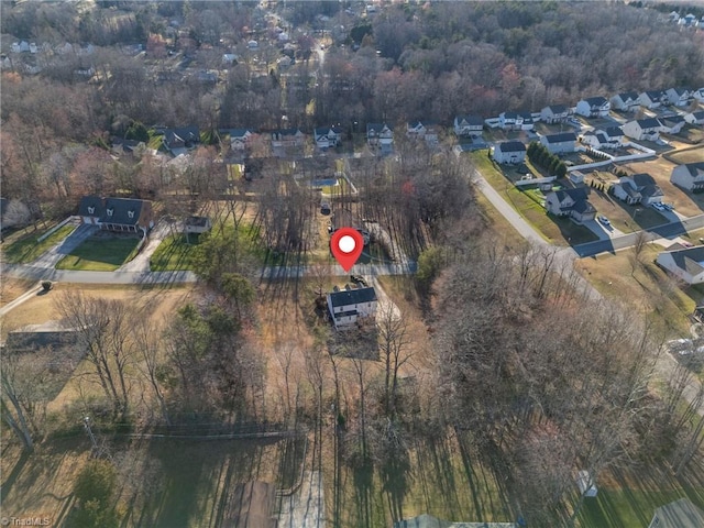 birds eye view of property with a residential view