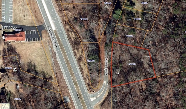 7708 Morefield Dr, Summerfield, NC 27358 - aerial map of property and surrounding area featuring property boundaries highlighted