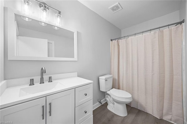 220 Glen Ter, Mount Airy, NC 27030 - full bath with toilet, wood finished floors, vanity, and baseboards