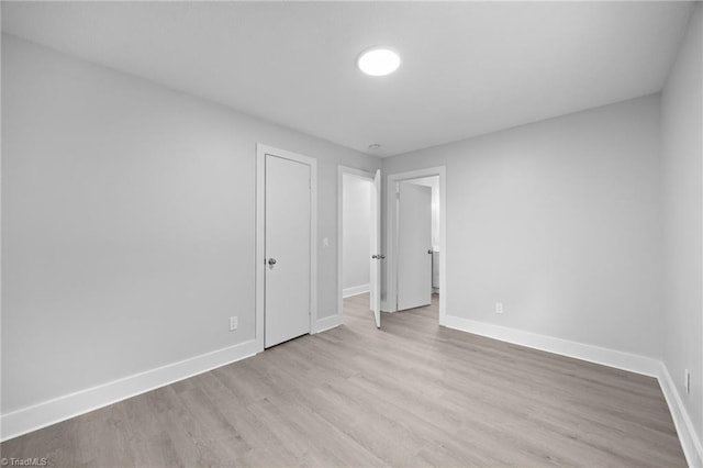 220 Glen Ter, Mount Airy, NC 27030 - unfurnished bedroom featuring baseboards and wood finished floors