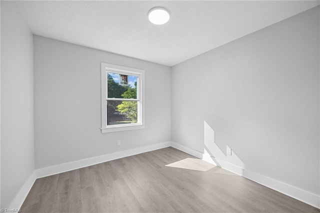 220 Glen Ter, Mount Airy, NC 27030 - unfurnished room featuring wood finished floors and baseboards