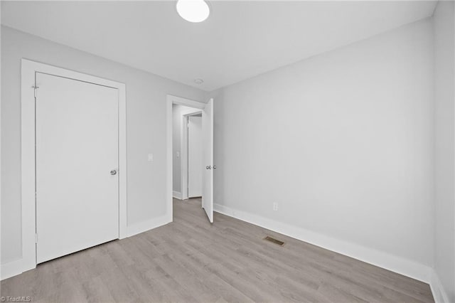 220 Glen Ter, Mount Airy, NC 27030 - unfurnished bedroom with wood finished floors and baseboards