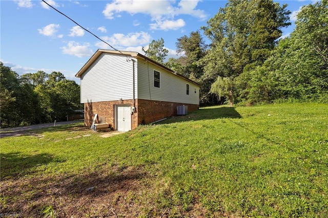 220 Glen Ter, Mount Airy, NC 27030 - view of side of home with brick siding, a lawn, and central AC unit