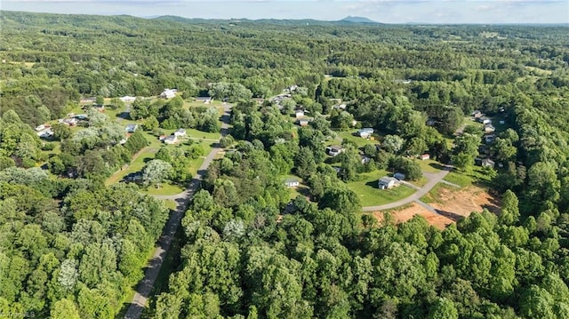 220 Glen Ter, Mount Airy, NC 27030 - aerial view of property and surrounding area featuring a heavily wooded area