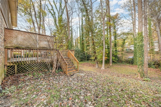 view of yard with a wooden deck